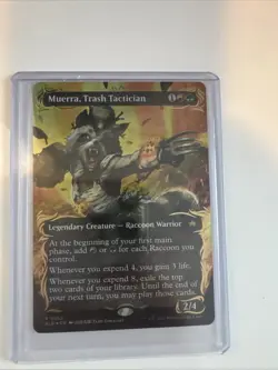 Muerra, Trash Tactician (Borderless) (Raised Foil) Bloomburrow Foil - Image 1