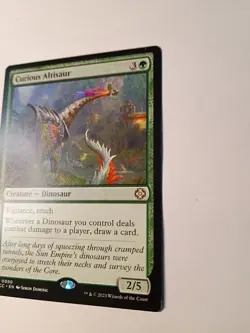 Curious Altisaur Commander: the Lost Caverns of Ixalan Regular - Image 1