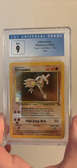 CGC 9 MINT Hitmonlee 1999 Fossil 7/62 Holo Pokemon Card psa - Image 1