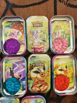 Pokemon Prismatic Evolutions Empty Mini Tins With Coins And Pictures - Image 3