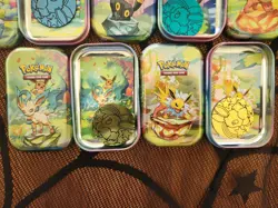 Pokemon Prismatic Evolutions Empty Mini Tins With Coins And Pictures - Image 4
