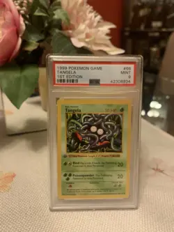 1999 POKEMON BASE SET 1ST EDITION #66 TANGELA PSA 9 - Image 1