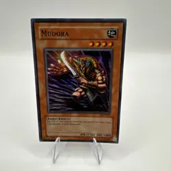 Yu-Gi-Oh! Mudora DCR-076 Super Rare Holo Yugioh TCG Card NM Near Mint - Image 1