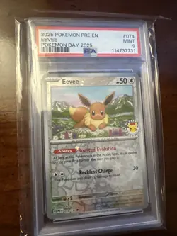 PSA 9 2025 Pokemon Day Pre En-Prismatic Evolutions #074 Eevee Reverse Holo - Image 1
