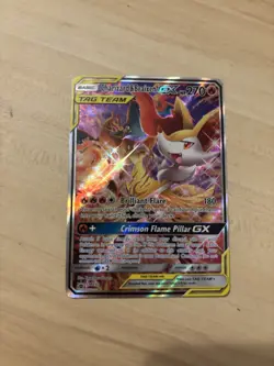 Charizard & Braixen GX Tag Team Pokemon card from the Sun & Moon Promo set Mint - Image 1