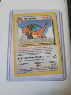 1999 Dragonite Stamped Kids WB Presents POKEMON the First Movie Pokemon Card - Image 1