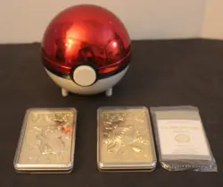 1999 Pair of 23K Gold Plated Pikachu Poliwhirl Trading Cards & Pokemon Ball - Image 1