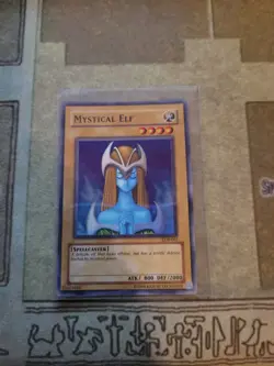 YUGIOH MYSTICAL ELF LOB-062 SUPER UNLIMITED ED NM 1996 - Image 1