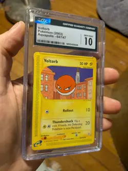 (TOP POP 10) CGC 10 GEM MINT Voltorb 64/147 Aquapolis Pokemon Card - Image 1