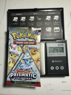 Pokemon Prismatic Evolutions Booster Pack -HEAVY 24.12g- Possible Demi/God Pack! - Image 1