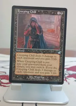 Creeping Chill (Retro Frame) Ravnica Remastered Regular #453 MTG Near Mint Unc. - Image 1