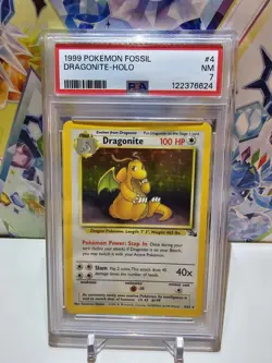 1999 Pokemon TCG Fossil Dragonite Holo Rare 1st Edition #4 PSA 7 - Image 1