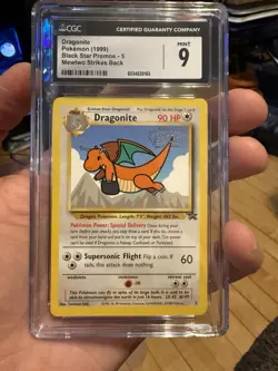1999 Pokemon Dragonite Black Star Movie Promo 5 CGC 9 - Image 1