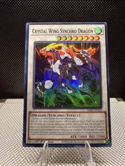 Yugioh! - Crystal Wing Synchro Dragon RA02-EN029 -SUPER Ra - 25'TH ANN. - NM/M - Image 1