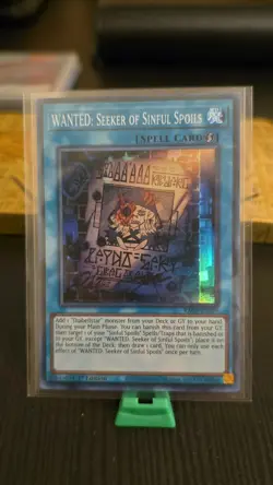 Wanted: Seeker of Sinful Spoils RA03-EN074 Super Rare 1st Edition NM Condition - Image 1