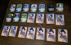 Lot Of 21 Dragon Ball Z Cards, Includes 3 Foil Cards And One Dragon Ball Marble - Image 1