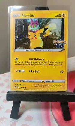 PROMO Birthday Present Pikachu SWSH234 NM / M - COSMOS HOLO - Pokemon Go Card - Image 1