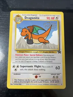 DRAGONITE - CGC 8 1999 Pokemon Black Star Promo WB Movie Gold Stamp - Image 1