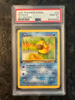 1999 Pokemon Fossil 53 Psuduck 1st Edition PSA 10 - Image 1