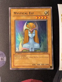 2002 YUGIOH 1ST Edition LOB-062 MYSTICAL ELF SUPER RARE Glossy NA 074💎LP +💎 - Image 2