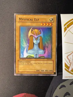 2002 YUGIOH 1ST Edition LOB-062 MYSTICAL ELF SUPER RARE Glossy NA 066💎NM +💎 - Image 1