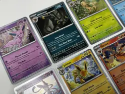 Pokemon Prismatic Evolutions Costco Mini Tins Cosmo Promo Cards (8 Cards Total) - Image 3