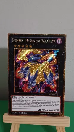 2015 Yugioh Number 14: Greedy Sarameya PGL2-EN017 Gold Secret Rare Premium Gold - Image 1