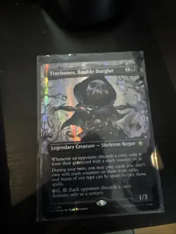 MTG Foundations Tinybones, Bauble Burglar Borderless Mana Foil #0388 - Image 1