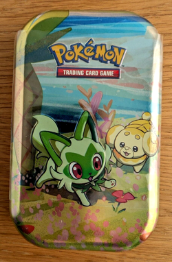 Paldea Friends Mini Tin - SPRIGATITO & FIDOUGH (2 Packs, 1 sticker sheet+) - Image 1