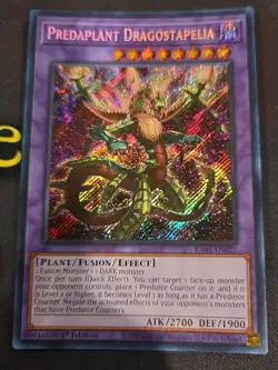 YuGiOh! - Predaplant Dragostapelia RA01-EN027 Secret Rare 1st Edition NM - Image 1