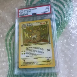 1999 Pokemon Fossil 1st Edition Raichu 14/62 Holo PSA 9 - Image 2
