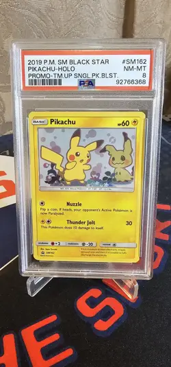 2019 Pokemon Sun & Moon Team Up Holo Pikachu Black Star Promo #SM162 PSA 8 - Image 1