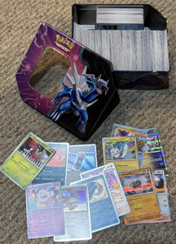 Pokemon Cards - Assorted Lot 630+ w/Collector's Tin - Image 1