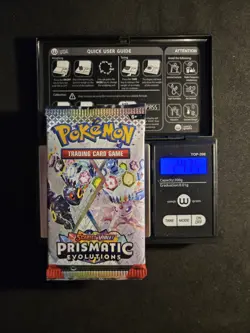 Pokemon TCG HEAVY Prismatic Evolutions Pack 24.35g!!! POSSIBLE GOD/ERROR PACK - Image 1