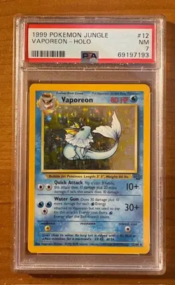 1999 Pokemon Jungle Holo Vaporeon #12 PSA 7 - Image 1