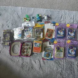 Lot of Pokemon Cards, Figures, Chips, and Sleeves OPENED Packs - Image 1