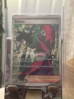 Pokemon TCG Atticus Trainer Prismatic Evolutions Ultra Rare Card 133/131 - Image 1