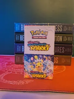 Pokemon TCG Surging Sparks Half Booster Box (18 Packs) Sealed - Image 1