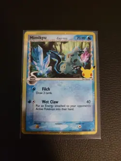 Pokemon TCG Mimikyu SWSH136 Delta Species Celebrations Black Star Promo Holo - Image 1