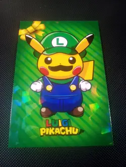 Pokemon 2024 Card Database Christmas Set Luigi Pikachu #2 Holo Peru US Seller - Image 1
