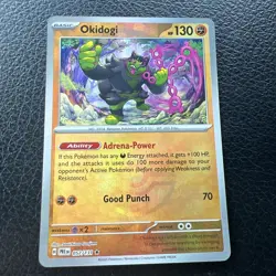 Pokemon TCG Okidogi Prismatic Evolutions Master Ball Pattern Holo Card 057/131 - Image 1