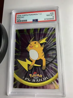 1999 Topps Pokemon TV #26 Raichu Foil Black Logo PSA 8 NM-MT - Image 1