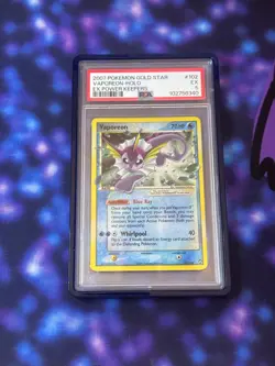 2007 POKEMON EX POWER KEEPERS #102 GOLD STAR VAPOREON HOLO PSA 5 (SWIRL) - Image 1
