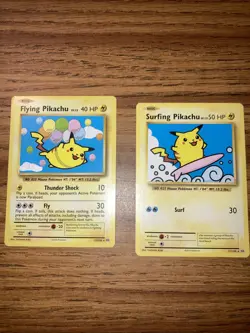 Flying Pikachu & Surfing Pikachu Pokemon Cards Set - Image 1
