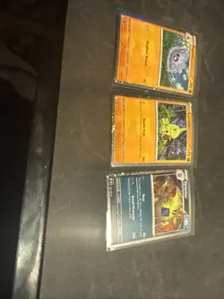 Tyranitar 135/193, Pupitar 111/193 & Larvitar 110/193 Cosmos Holo Pokemon Set - Image 1