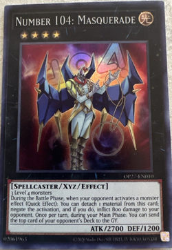 Yu-Gi-Oh! Number 104: Masquerade OP27-EN010 Super Rare - Near Mint Free Shipping - Image 1