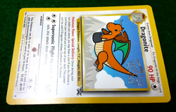 1999 POKEMON TCG DRAGONITE #5 WOTC Black Star 1st Movie PROMO WOC STAMPED - Image 1