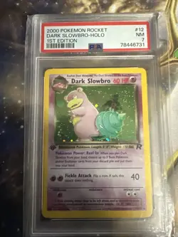 PSA 7 Dark Slowbro Holo - 1st Edition Team Rocket 12/82 Pokemon Card NM WOTC - Image 1