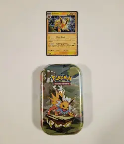 Pokemon Prismatic Evolutions Jolteon TCG Mini Tin Sealed + Jolteon Foil Card - Image 1