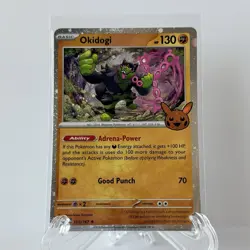 Okidogi 111/167 2024 Trick Or Trade Pokemon TCG Cosmos Holo Rare NM - Image 1
